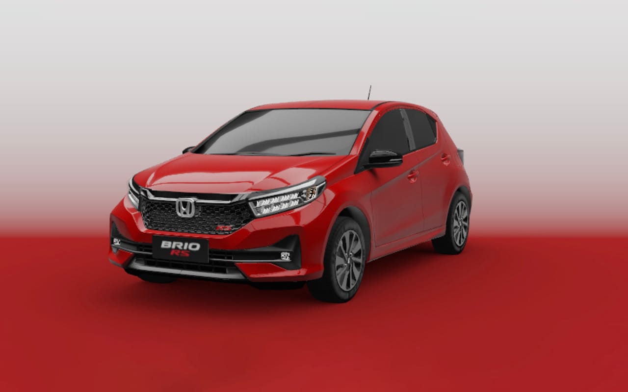 Mobil Honda Brio warna merah untuk disewa di Bali, cocok untuk wisata keluarga kecil.
